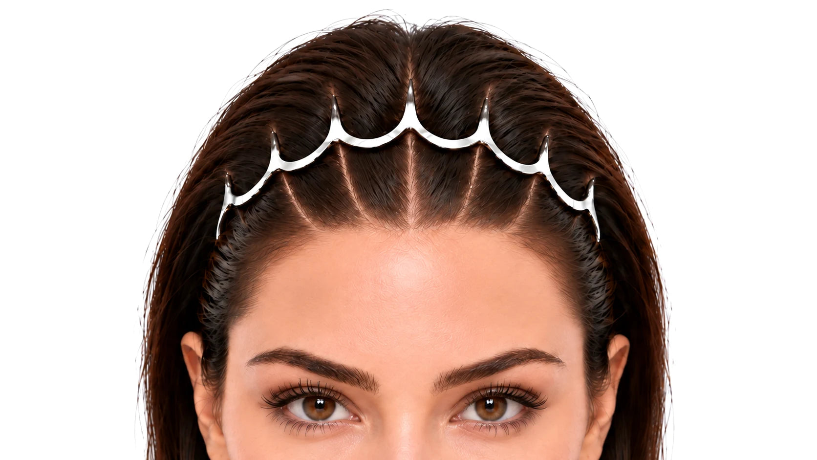 A woman with dark brown hair and brown eyes wearing the polished steel Zig Zag Hairband, which parts her hair into neat sections